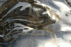 Miss Mao Trying to Poise Herself at the Top of Lenin's Head