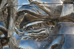 Miss Mao Trying to Poise Herself at the Top of Lenin's Head